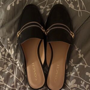 Coach Black Flats with Gold Chain Detail